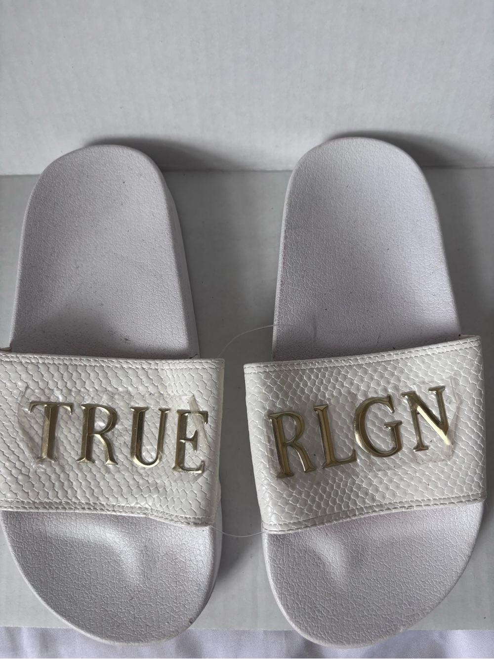True Religion size 7 NWT White Slide Sandals with Gold Lettering